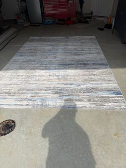Two Identical Rugs.