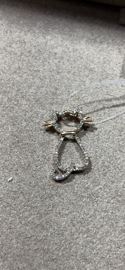 Gold cat pendant