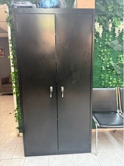 Large metal black cabinet with key