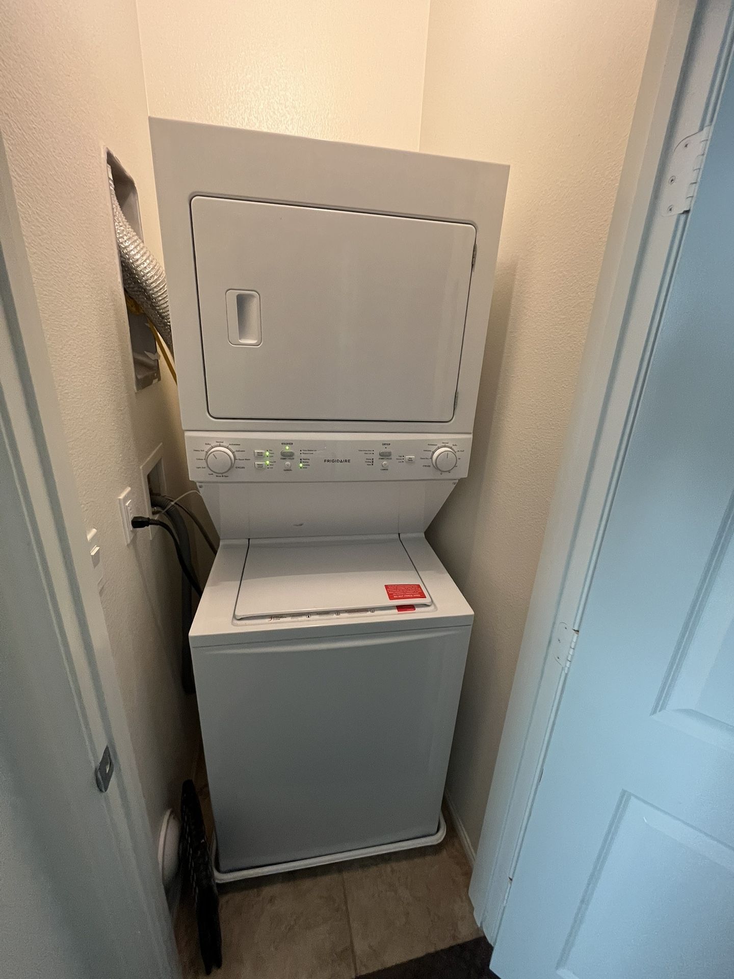 Like New Frigidaire Quick Wash Dry Cycle, Maxfill Stacked Laundry Center with 3.9-cu ft Top load Washer and Electric 5.6-cu ft Dryer