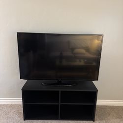 Samsung TV and TV stand