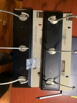 Two - 3 hook and board hanger wall units. Cost is for both units. Brand new with hardware.