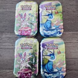 Prismatic Tins Pokemon 