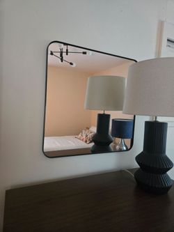 Mirror with black frame
