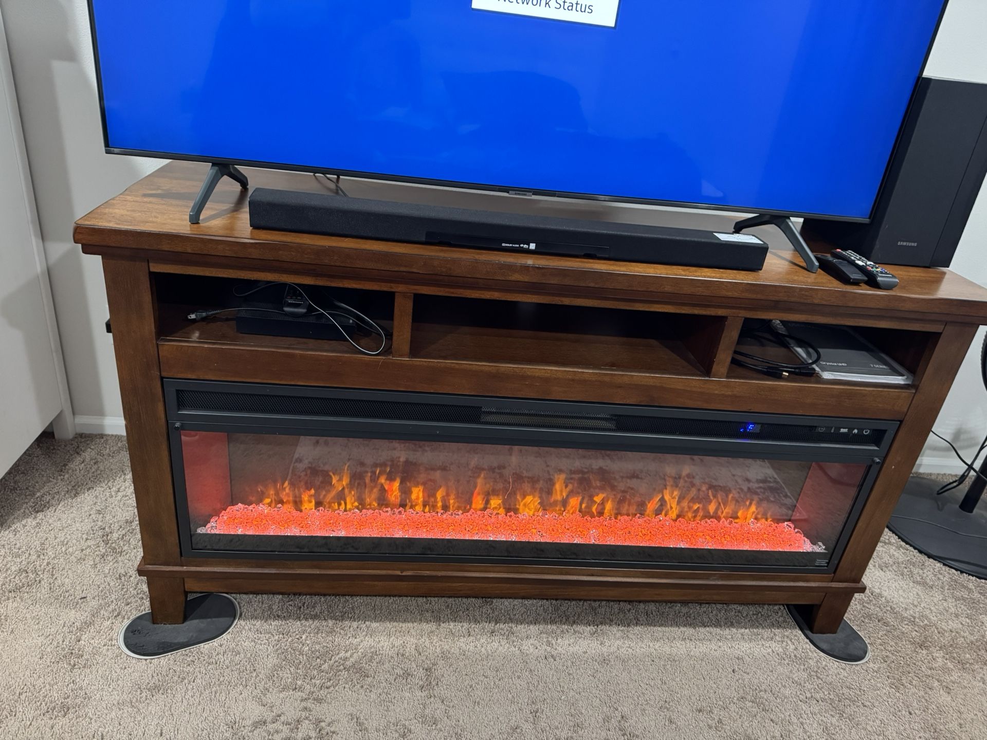 Electric Fireplace w/ 65” Samsung Smart Tv , Samsung Soundbar & Subwoofer 