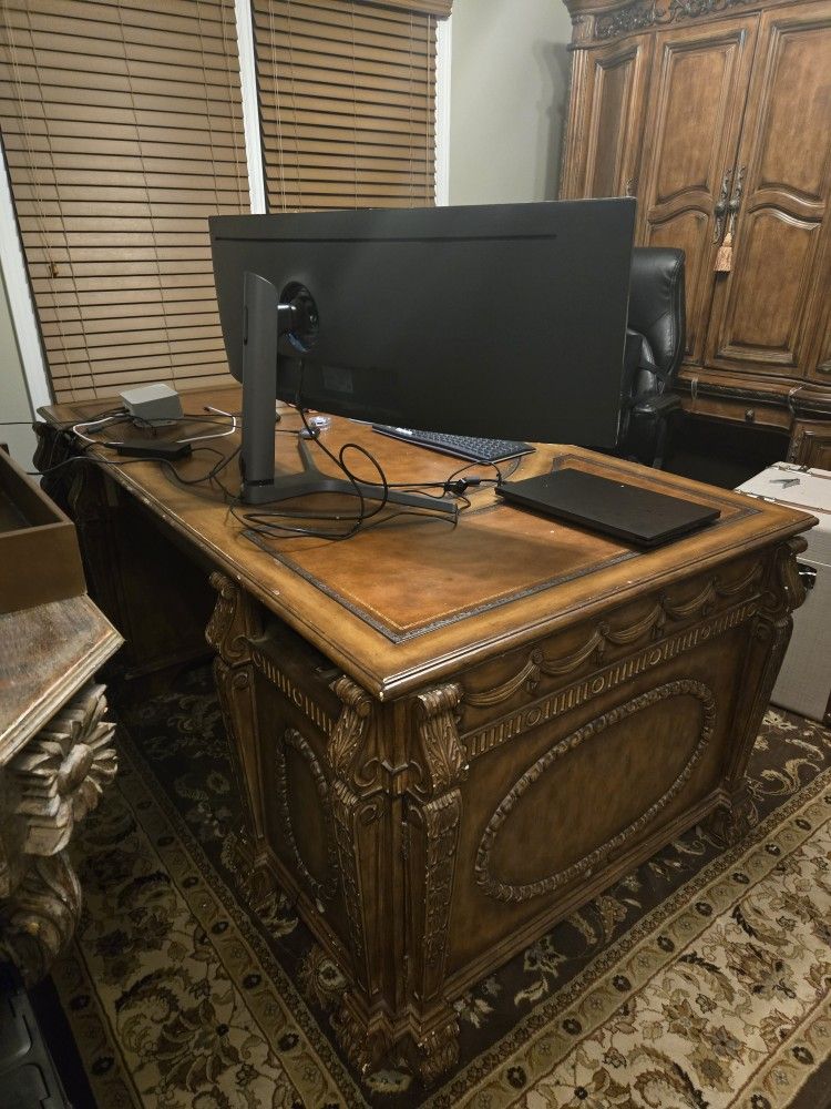 HOOKER FURNITURE PARTNER'S DESK, SEVEN SEAS COLLECTION, EMBOSSED LEATHER TOP, HAND CARVED, GLAZED MEDIUM FINISH, APPROX 77"W X 38"D X 31"H. Desk is us