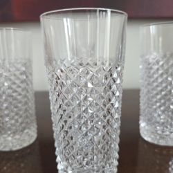 Set of four Royal Crystal Rock La Piana crystal tumblers with diamond cut detailing.