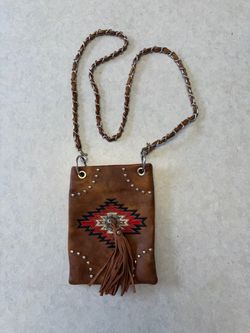 P&G western/aztec style faux leather crossbody with tassel