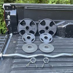 OLYMPIC  EZ  CURL  BAR  = 70    LBS.   OF  OLYMPIC  PLATES  (PAIRS OF)  :  25s  &  [TWO PAIRS]  OF  5s  