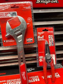 MILWAUKEE 12” ADJUSTABLE WRENCH #48-22-7412 and 6 in 1 8GA -20GA wire stripping capacity #48-22-3079Y both for $32