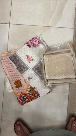 2 Tablecloths and a set of napkins