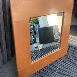 Large faux leather mirror. 40x40”
