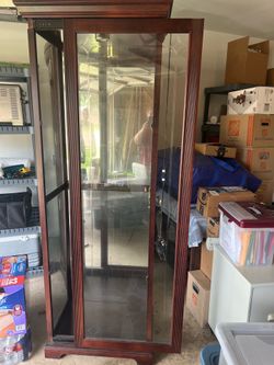 Beautiful Lighted Curio Cabinet with locking sliding door