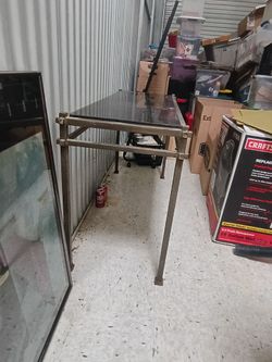 Iron console table with granite top
