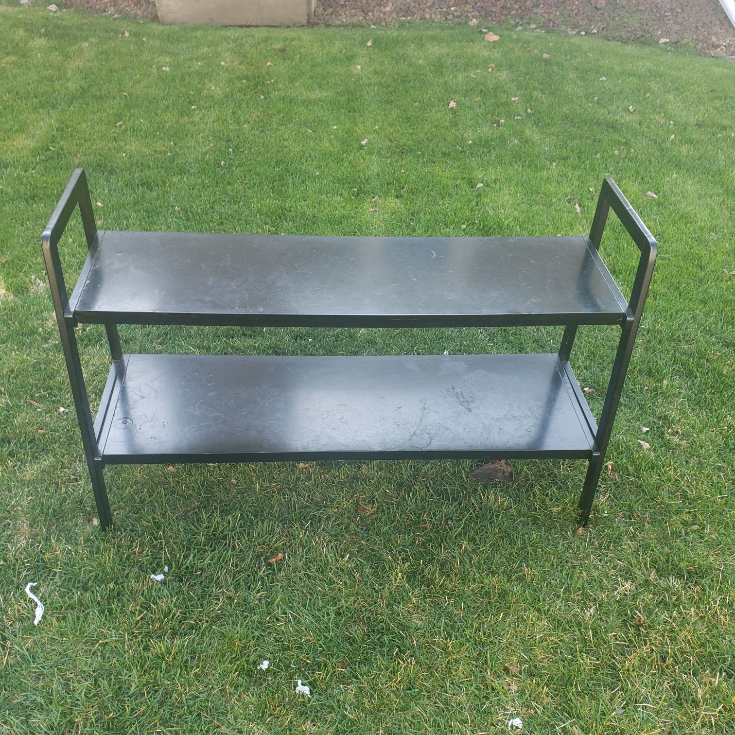 Black 2 shelf stand. Dimensions 48" wide x 30" tall