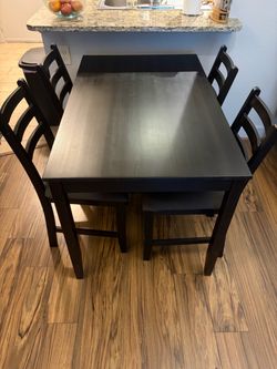 Black table and chairs