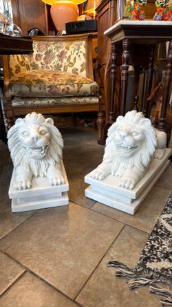 Antique extremely solid marble lion’s. You must have two people to pick one up.