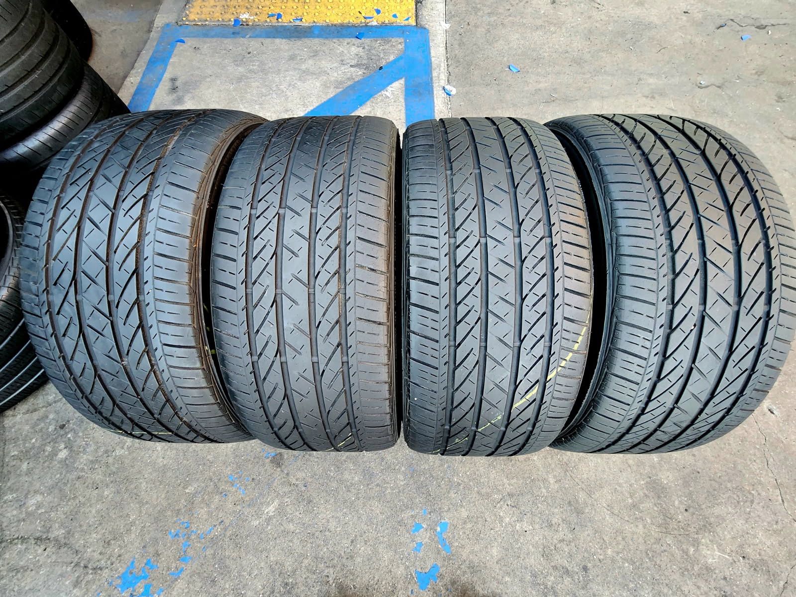 2 USED TIRES BRIDGESTONE 235/40/19