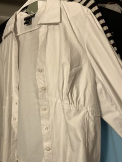 Woman’s white long sleeve shirt