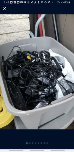 LARGE STORAGE BIN FILLED  WITH TONS OF USED LAPTOP CHARGERS