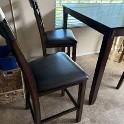 Burnished brown five piece table set from Ashley furniture