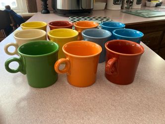11-fiesta -ware round handled 3-1/2 inch coffee mugs