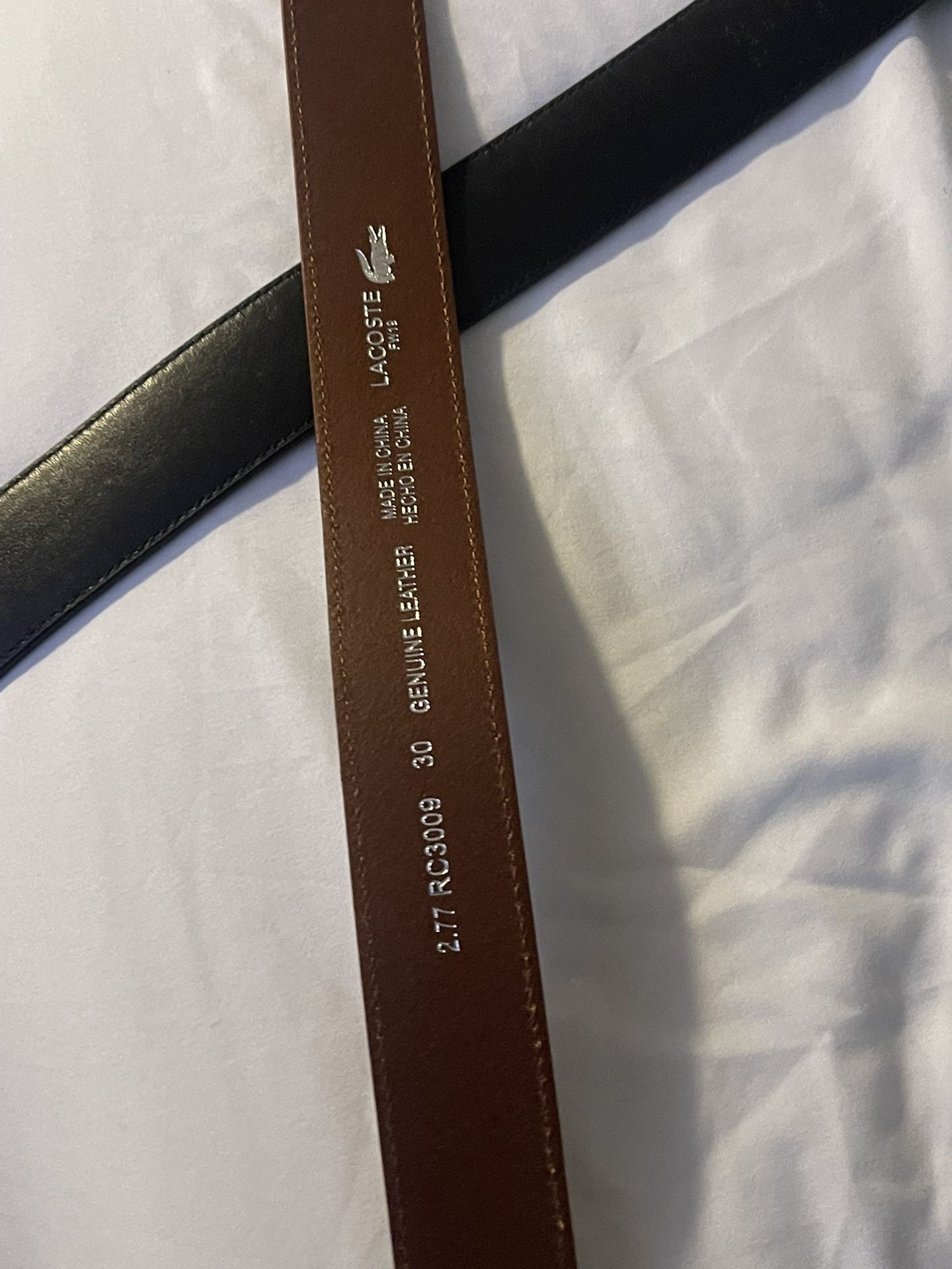 Coach belt and Lacoste belt 