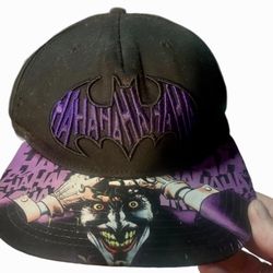 Batman Joker Sublimated Bill Snapback Hat! Featuring Joker’s signature “HAHA”s within the classic Batman logo 