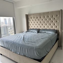 Beige bed frame for king size bed