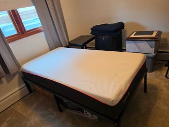 Twin Tulo Liv medium firm memory foam mattress, frame ,protector,sheets and comforter