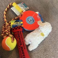 brand new dog toys still in packaging