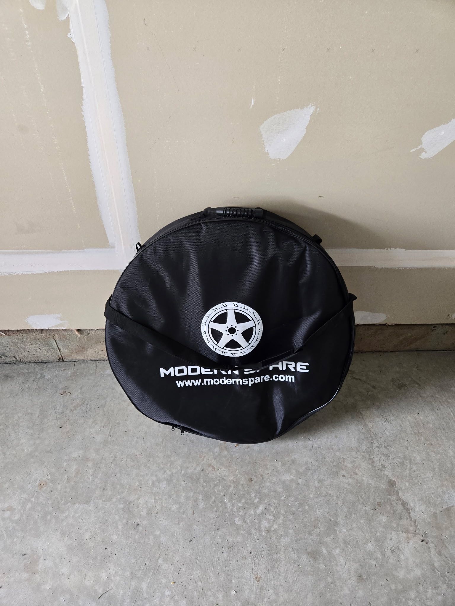 Modern Spare Tesla Tire And Accessory Kit