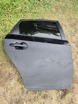 2010 - 2015 Toyota Prius black rear passenger door (RH)