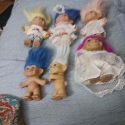 Six Troll Dolls