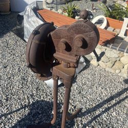 Antique Blower And Limestone Sharpener And Other Antique