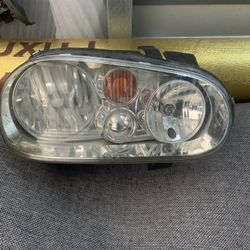02-05 VW PASSENGER SIDE HEADLIGHT 