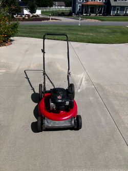 Big wheel push lawnmower runs perfect PLUS,, I accept broken mowers traded in !