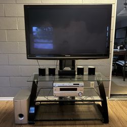 TV Stand, TV, Home Theater And Sofa  