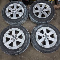 Set of 4 oem wheel 95% new Uniroyal 185 65 R15 tires off 2008 Toyota prius hybrid 5x100mm