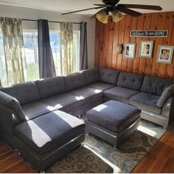 New Modular Sectional .  Grey Chenille Fabric .  .102” X 132” X 66”.  Free Delivery !