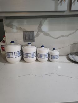Vintage set blue and white canisters
