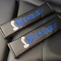 2 Carbon Fiber Shelby Seat Belt Padded Covers. Emblems Badges Available SHIPPING AVAILABLE 