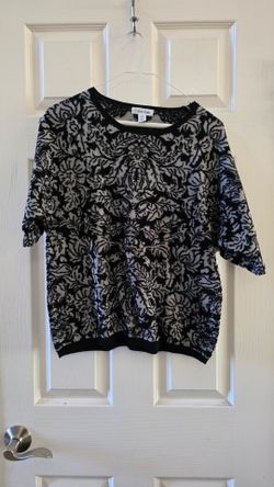 CK black/white knitted top and CK night shirt, red NY t-shirt and floral top