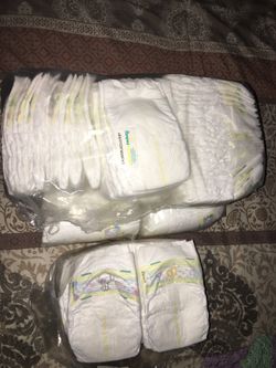 Pamper Newborn in excellent condition about 9 to 100 pieces