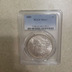 1889 Morgan Silver Dollar.  Graded 
