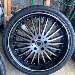 Silver and Black Borghini  20 inch rims and tires . Bolt pattern is 5 x 114.3