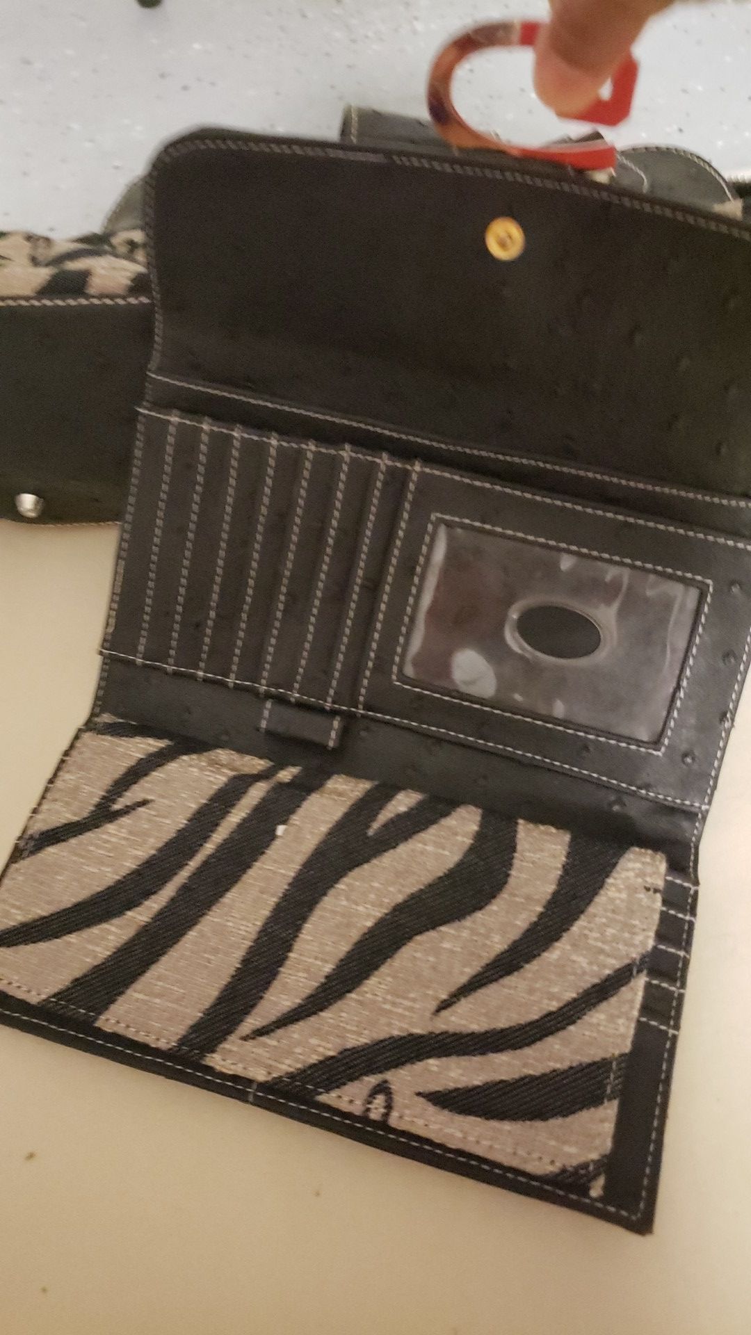 Set of black and tan purse and wallet