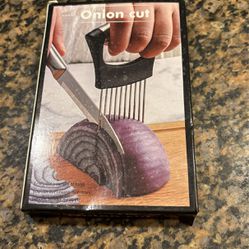 The Onion Cut.  Hold And Cut Onions Effortlessly.  A Must Have In The Kitchen 
