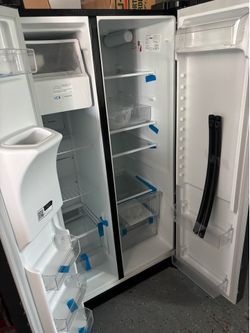 Frigidaire 25.6-cu ft Standard-Depth 36-in Wide Side-by-Side Refrigerator with Ice Maker ,Water