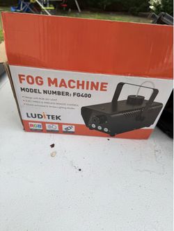 Fog Machine, which includes RGB LED lights for lighting effects.The machine features both wired and wireless remote controls for flexible https://offe